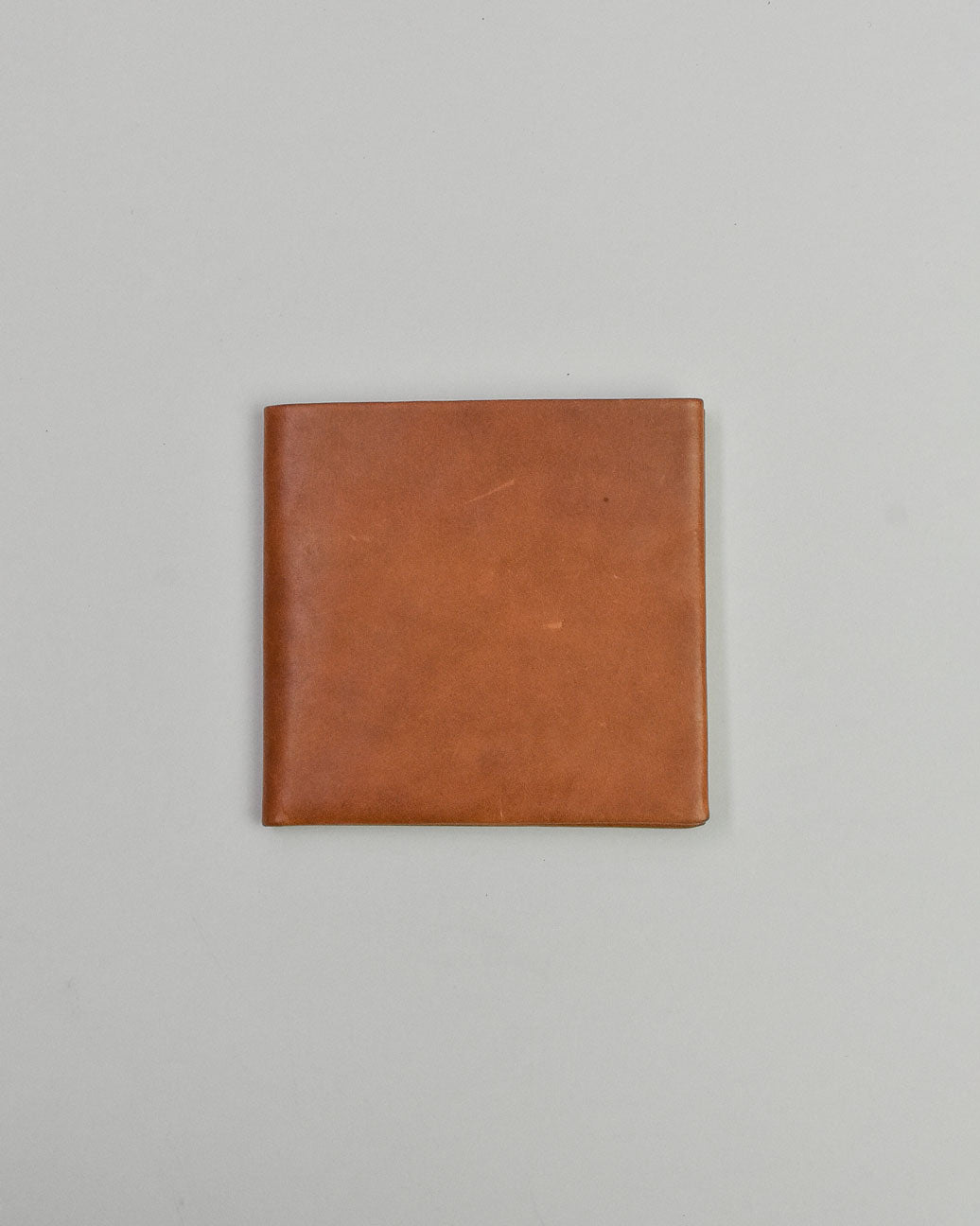 simetrie busyman x simétrie one piece bifold wallet / tan