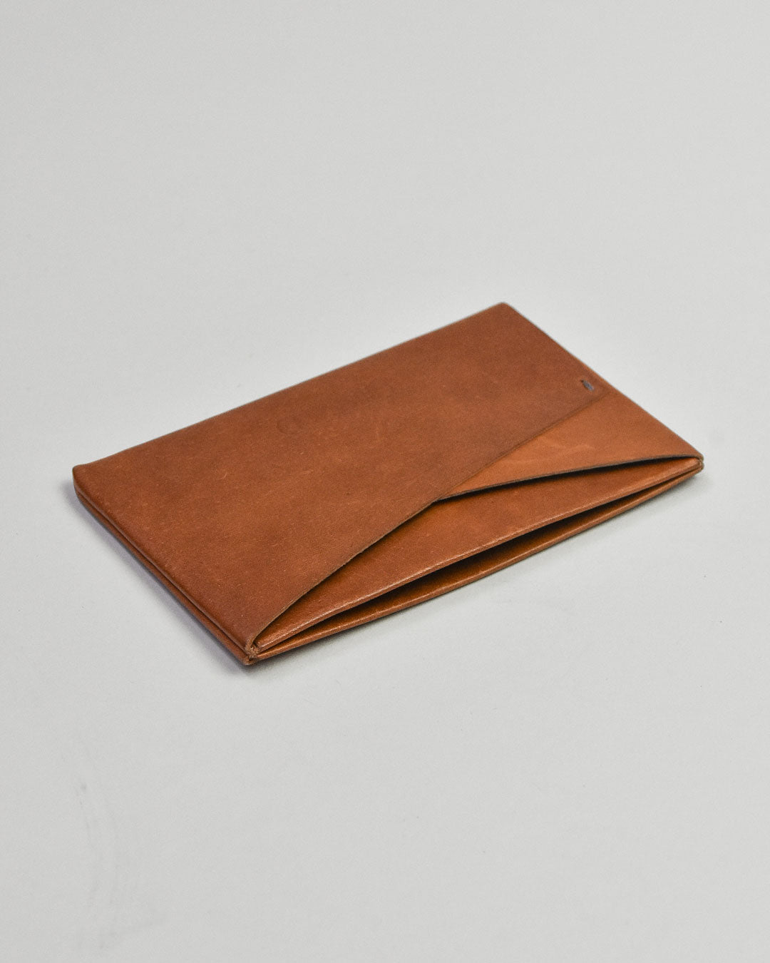 simetrie busyman x simétrie one piece card wallet / tan