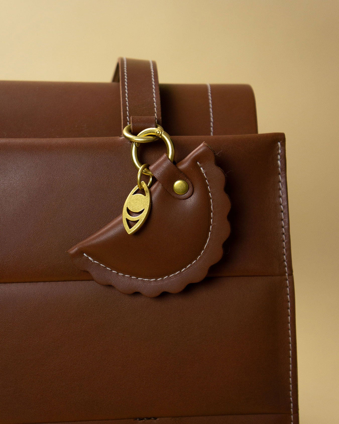 ravjul bag charm / red rock