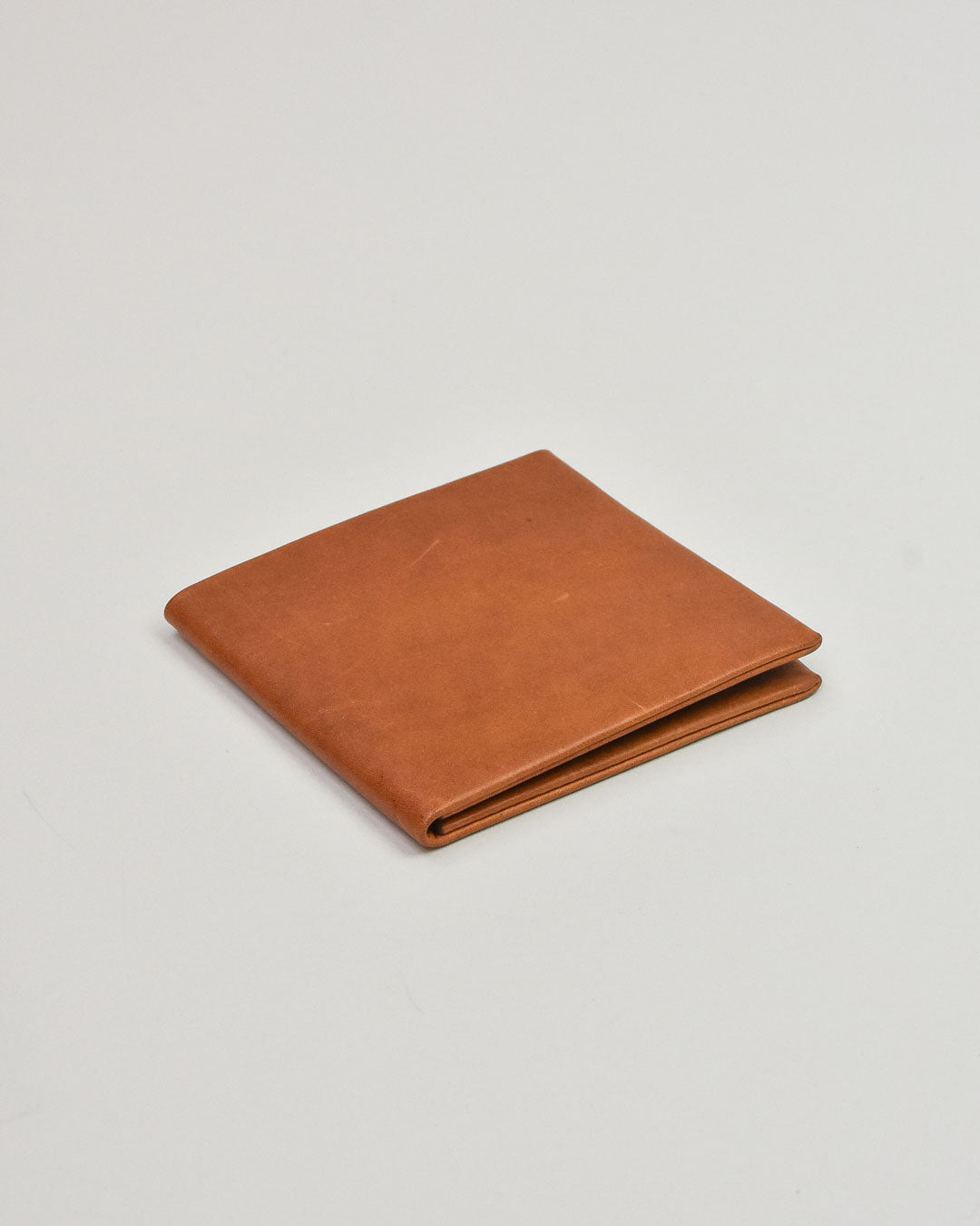 busyman x simétrie one piece bifold wallet / tan